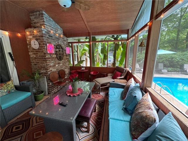 2671 Club Forest Ct SE, Conyers, GA 30013 - sunroom featuring outdoor lounge area, a ceiling fan, and vaulted ceiling