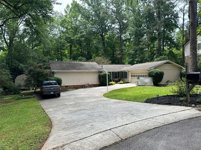 2671 Club Forest Ct SE, Conyers, GA 30013 - single story home with driveway, a front lawn, and a garage