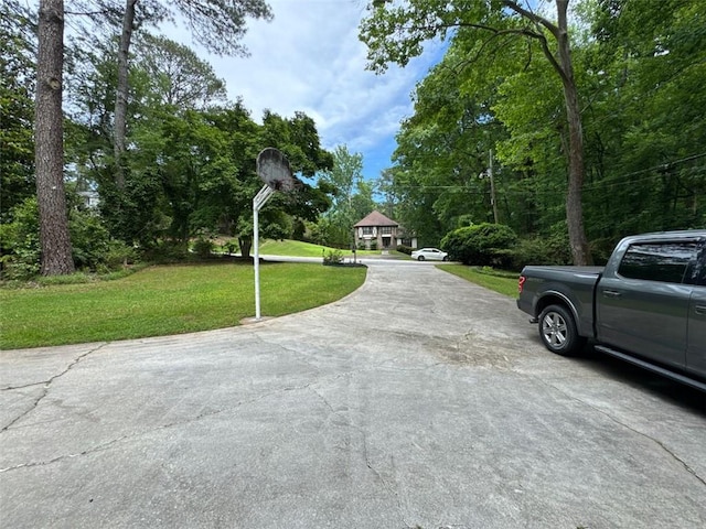 2671 Club Forest Ct SE, Conyers, GA 30013 - view of concrete driveway