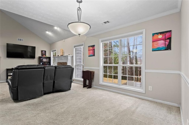 carpeted living room featuring visible vents, ornamental molding, a textured ceiling, baseboards, and lofted ceiling