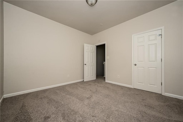 unfurnished bedroom with carpet floors