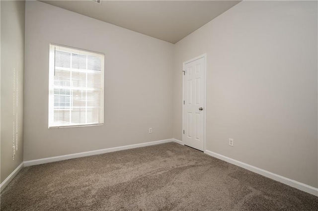 spare room with carpet flooring