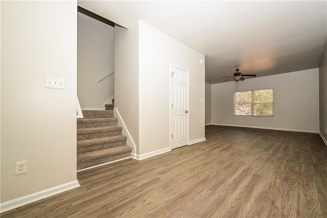 interior space with ceiling fan and hardwood / wood-style floors