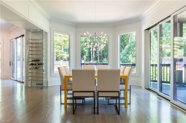 sunroom with an inviting chandelier