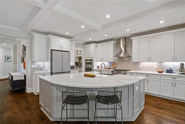629 2nd Ave, Decatur, GA 30030 - kitchen with wall chimney range hood, a sink, appliances with stainless steel finishes, crown molding, and tasteful backsplash