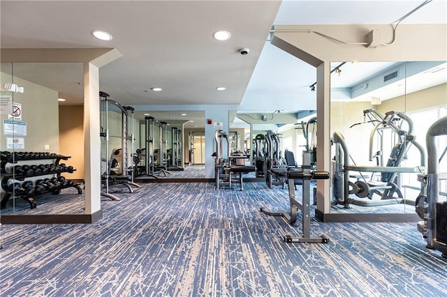 gym featuring carpet floors and recessed lighting