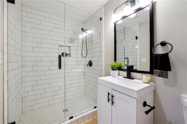 bathroom featuring vanity and walk in shower