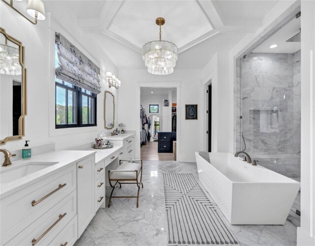 bathroom with vanity, an inviting chandelier, marble finish floor, a walk in shower, and a soaking tub