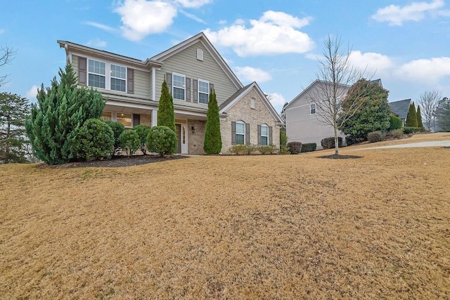 view of property with a front lawn