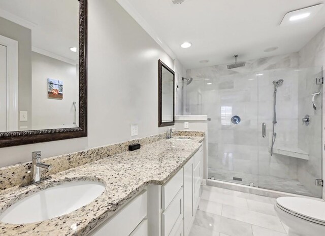 full bath with crown molding, a stall shower, toilet, double vanity, and recessed lighting