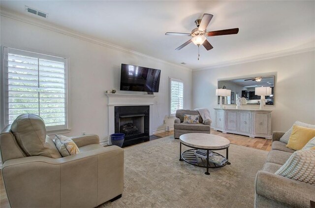 544 Pine Way, Dallas, GA 30157 - living area with a ceiling fan, ornamental molding, a fireplace with flush hearth, and wood finished floors