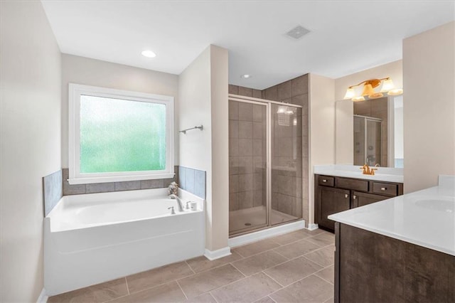544 Pine Way, Dallas, GA 30157 - full bath featuring vanity, a shower stall, a garden tub, tile patterned flooring, and baseboards
