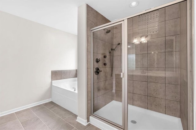 544 Pine Way, Dallas, GA 30157 - full bathroom featuring a garden tub, a stall shower, baseboards, and recessed lighting
