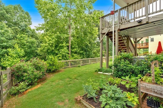 544 Pine Way, Dallas, GA 30157 - view of yard featuring a vegetable garden, a deck, and stairway