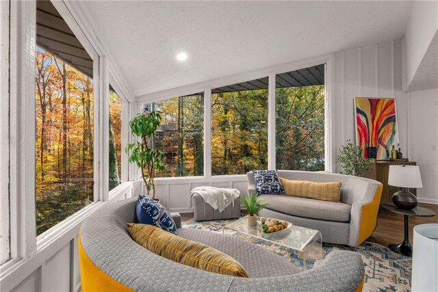 sunroom with a wealth of natural light and vaulted ceiling