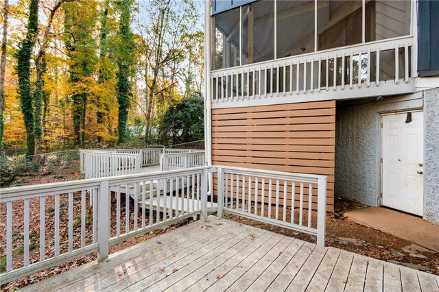 deck featuring a sunroom