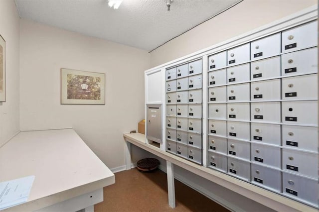 view of property's community featuring mail area
