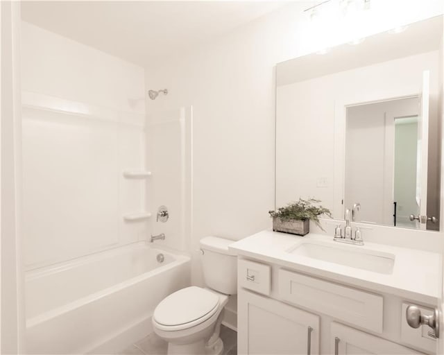 bathroom featuring shower / bath combination, vanity, and toilet