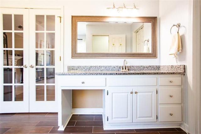 bathroom featuring vanity and french doors