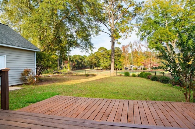 wooden deck with a yard