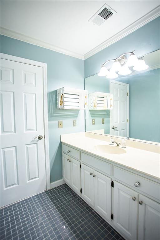 bathroom with vanity and ornamental molding