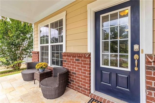 441 Spring View Dr, Woodstock, GA 30188 - doorway to property featuring covered porch and brick siding