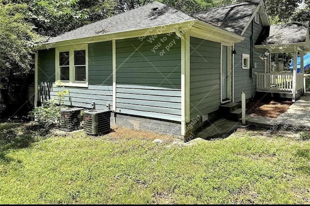 1914 N Ave NW, Atlanta, GA 30318 - view of property exterior featuring a yard, entry steps, and roof with shingles