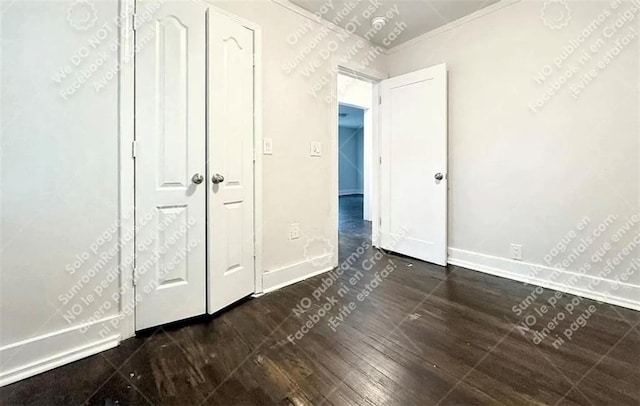 1914 N Ave NW, Atlanta, GA 30318 - unfurnished bedroom with baseboards and wood finished floors