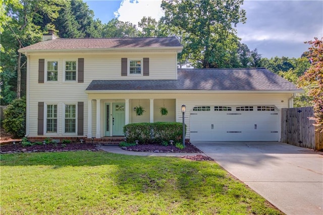 6006 Lanier Heights Cir, Buford, GA 30518 - view of front of property with a chimney, an attached garage, covered porch, driveway, and roof with shingles