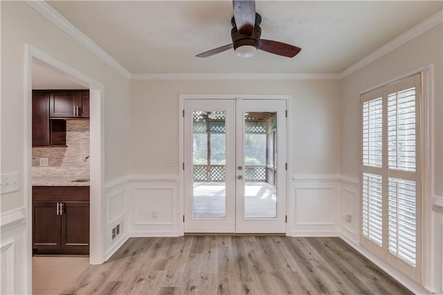 6006 Lanier Heights Cir, Buford, GA 30518 - doorway to outside featuring french doors, light wood-type flooring, a decorative wall, a ceiling fan, and crown molding