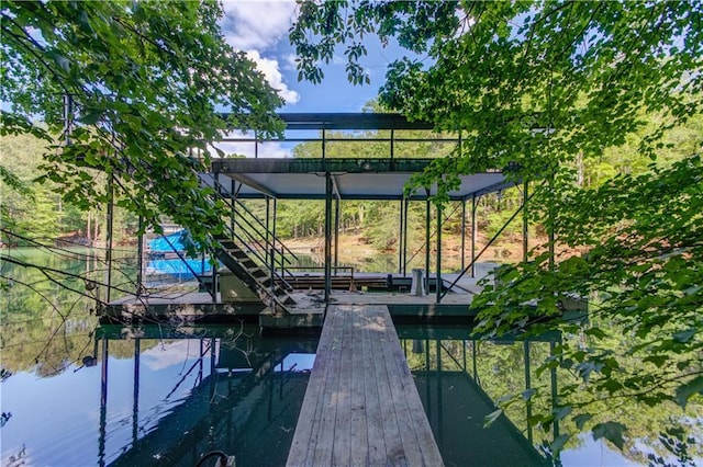 6006 Lanier Heights Cir, Buford, GA 30518 - dock with boat lift and a water view
