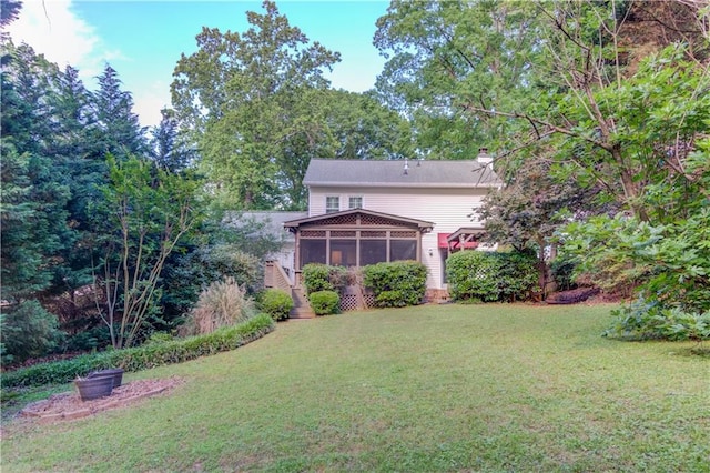 6006 Lanier Heights Cir, Buford, GA 30518 - view of grassy yard with a sunroom