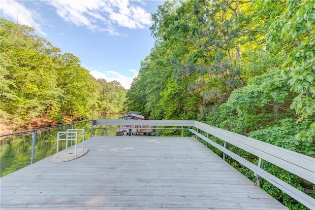 6006 Lanier Heights Cir, Buford, GA 30518 - wooden deck with a wooded view