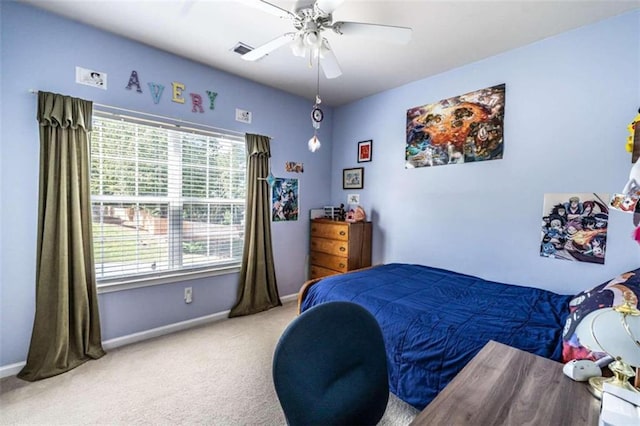 carpeted bedroom featuring ceiling fan