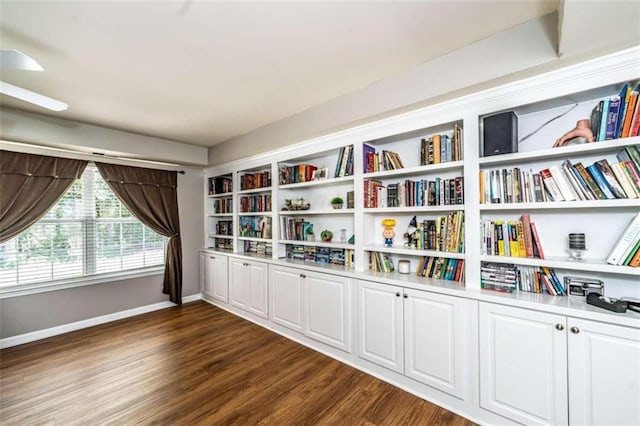 unfurnished room with dark hardwood / wood-style floors