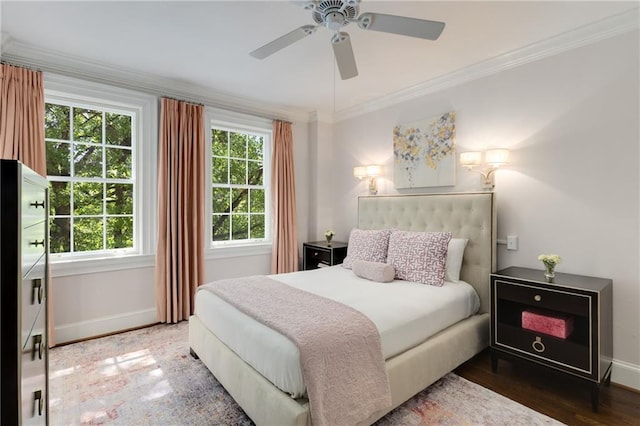 1325 Peachtree St NE Unit 401, Atlanta, GA 30309 - bedroom featuring baseboards, ornamental molding, ceiling fan, and multiple windows