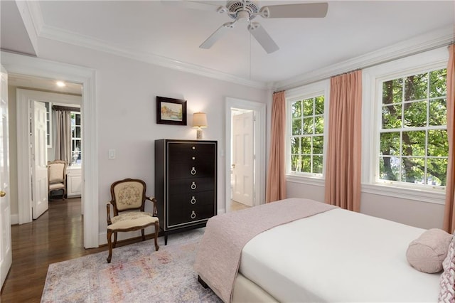 1325 Peachtree St NE Unit 401, Atlanta, GA 30309 - bedroom featuring crown molding, ceiling fan, ensuite bath, baseboards, and wood finished floors