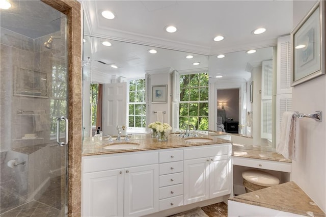 1325 Peachtree St NE Unit 401, Atlanta, GA 30309 - bathroom with a sink, ornamental molding, and a shower stall