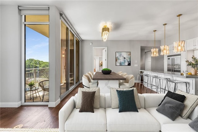 1820 Peachtree St NW Unit 804, Atlanta, GA 30309 - living room with dark wood-style floors and a chandelier
