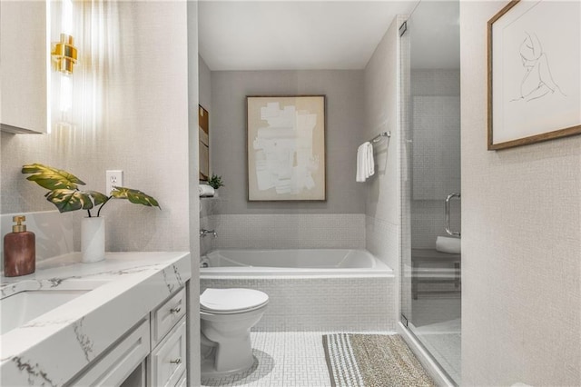 1820 Peachtree St NW Unit 804, Atlanta, GA 30309 - bathroom with vanity, a garden tub, a shower stall, and tile patterned flooring