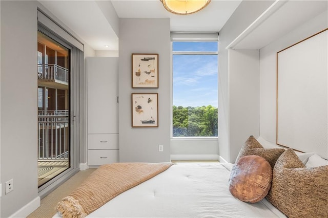 1820 Peachtree St NW Unit 804, Atlanta, GA 30309 - bedroom with carpet floors and access to exterior