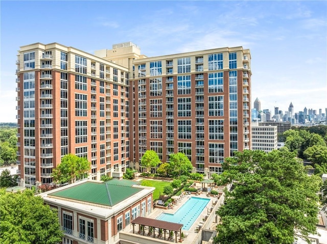 1820 Peachtree St NW Unit 804, Atlanta, GA 30309 - view of building exterior featuring a community pool and a view of city