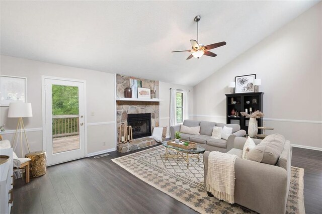 1140 Reading Dr NW, Acworth, GA 30102 - living area with a ceiling fan, dark wood finished floors, a fireplace, and lofted ceiling