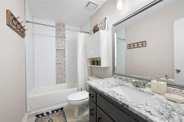 1140 Reading Dr NW, Acworth, GA 30102 - bathroom featuring vanity, shower / bath combo with shower curtain, a textured ceiling, and tile patterned floors
