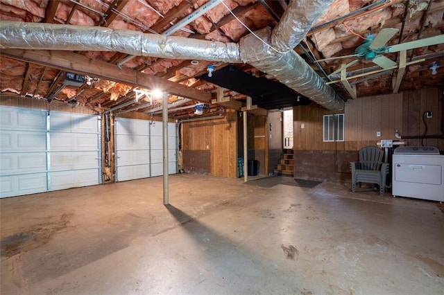 1140 Reading Dr NW, Acworth, GA 30102 - garage with washer / clothes dryer, wood walls, and a garage door opener