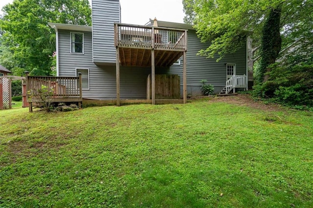 1140 Reading Dr NW, Acworth, GA 30102 - rear view of property featuring a yard, a wooden deck, and a chimney