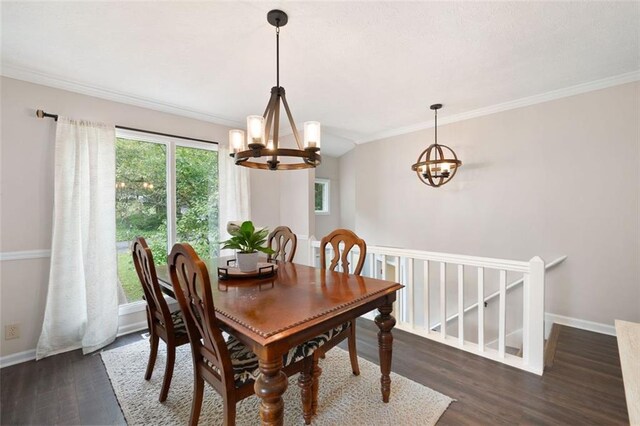 1140 Reading Dr NW, Acworth, GA 30102 - dining room featuring a chandelier, dark wood finished floors, and ornamental molding