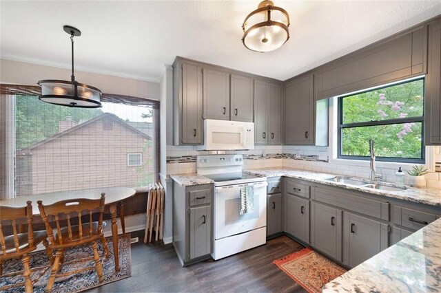 1140 Reading Dr NW, Acworth, GA 30102 - kitchen featuring white appliances, gray cabinets, plenty of natural light, dark wood-type flooring, and ornamental molding