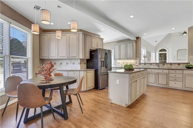 1215 Wynridge Xing, Alpharetta, GA 30005 - kitchen with stainless steel refrigerator with ice dispenser, a center island, backsplash, light wood-type flooring, and lofted ceiling
