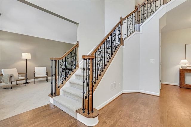 1215 Wynridge Xing, Alpharetta, GA 30005 - stairs with baseboards, wood finished floors, and a high ceiling